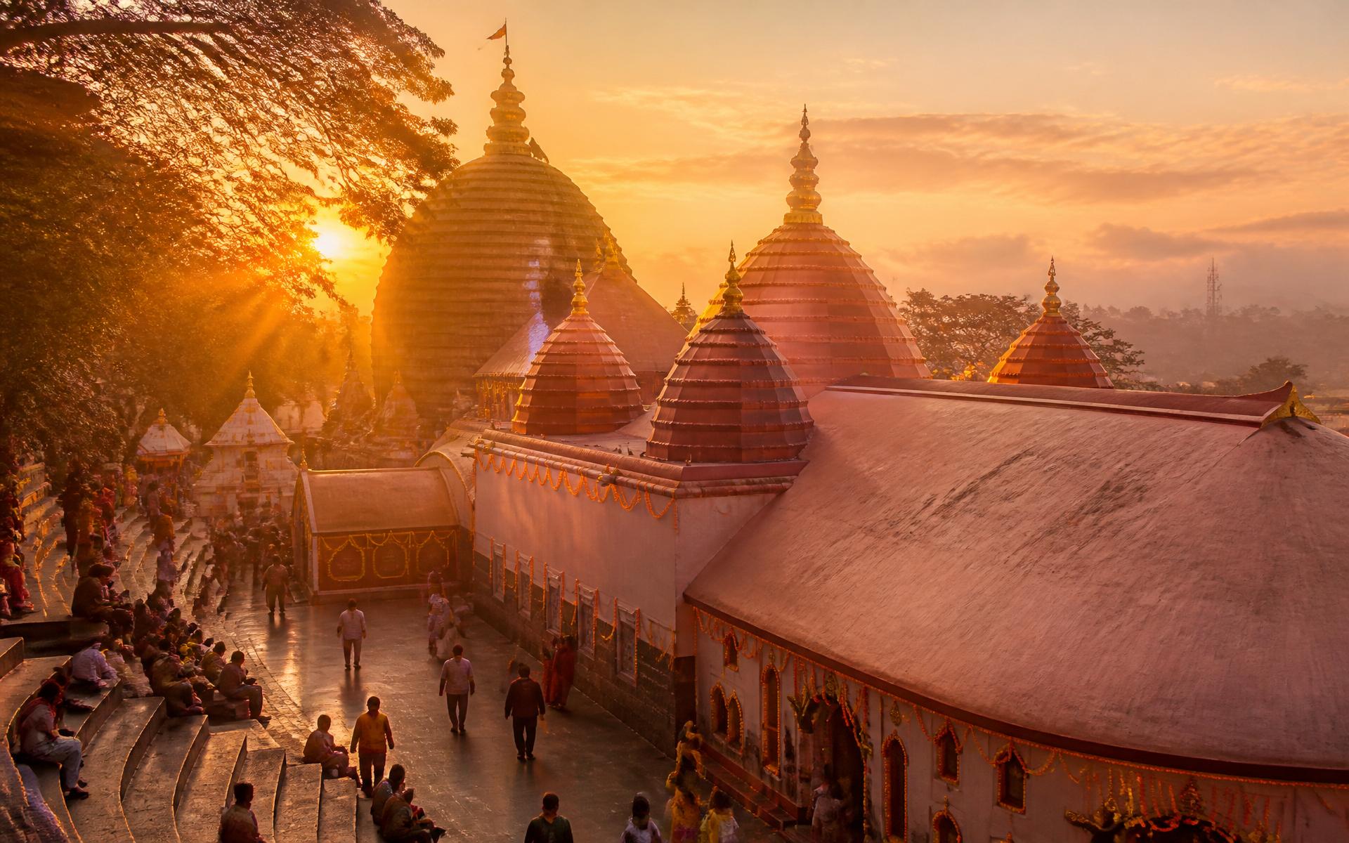 Sacred temple silhouette at golden sunrise